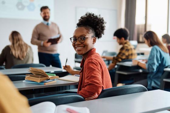 Adult learner in an intermediate French conversation class